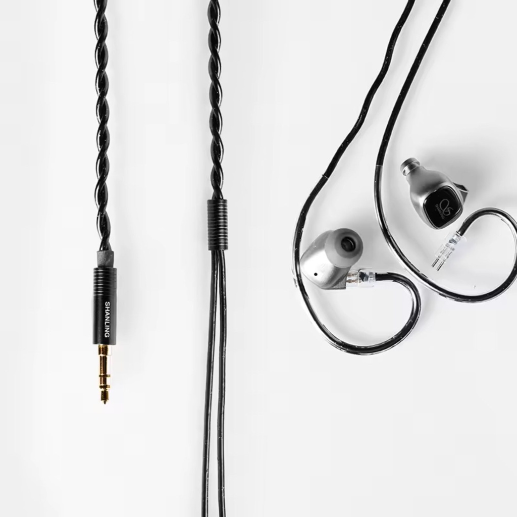Shanling MG20 — IEM dinámico 10 mm DLC, cuerpo aleación de zinc, 3,5 mm / USB-C con DAC.